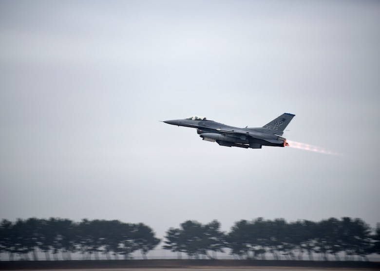 A U.S. Air Force F-16 Fighting Falcon assigned to the 8th Fighter Wing takes off from Kunsan Air Base, Republic of Korea, Dec. 3, 2018. The F-16 is a compact, multi-role fighter capable of air-to-air combat and air-to surface attack. (U.S. Air Force photo by Tech. Sgt. Charles McNamara)