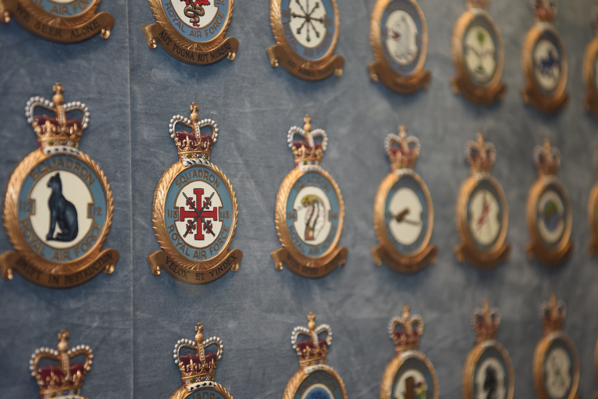 Royal Air Corps and Royal Air Force squadron patches on display in Hangar III at the RAF Museum, London, England, Nov. 30, 2018. The RFC was the air arm of the British Army before and during World War I, until it merged with the Royal Naval Air Service on April 1, 1018 to form the RAF. (U.S. Air Force photo by Airman 1st Class Brandon Esau)