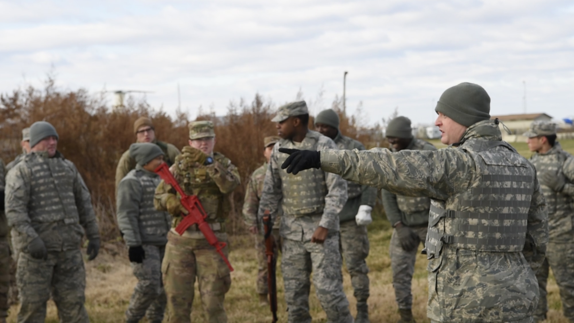 Tech. Sgt. Casey Reed, 436th Civil Engineer Squadron unit deployment manager, directs a group of Airmen for the Individual Movement Techniques portion of Prime Base Engineer Emergency Force (Prime BEEF) Day on Nov. 28, 2018, at Dover Air Force Base, Del. Prime BEEF Day is a squadron-wide training day focused on maintaining and refreshing all civil engineering Airmen on readiness requirements and operational capabilities. (U.S. Photo by Airman First Class Dedan D. Dials)