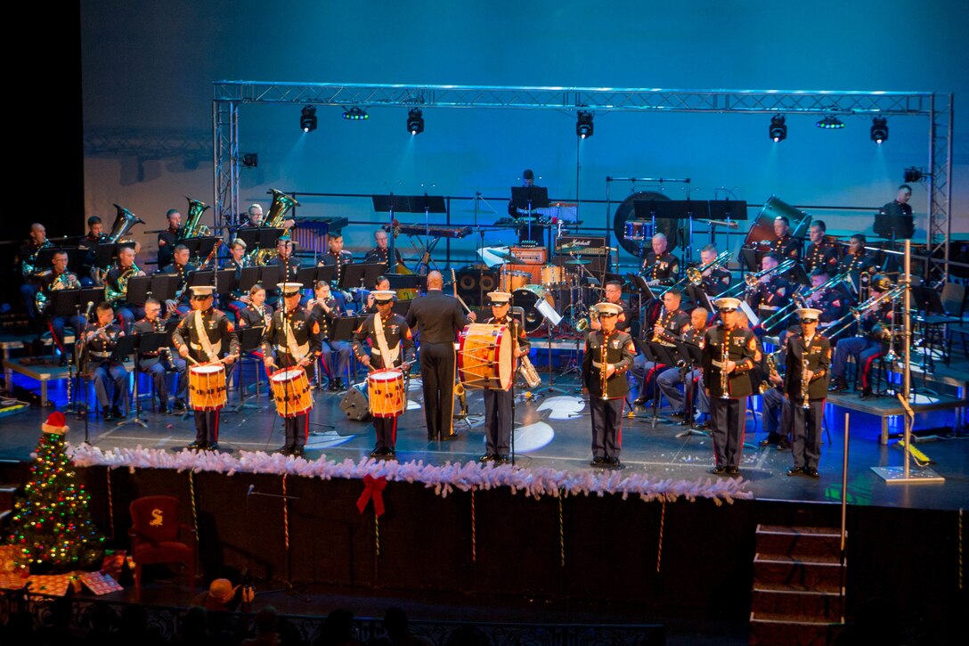 Members of the Marine Forces Reserve Band, perform at Saenger Theatre for the annual holiday concert in New Orleans, Dec. 9, 2018. The performance is one of multiple holiday concerts the band arranged throughout December to promote the Marine Corps Reserve Toys for Tots program, which donates toys to less fortunate children in the community. (U.S. Marine Corps photo by Lance Cpl. Samantha Schwoch)