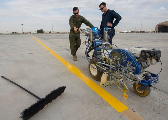 Marines offer helping hand to paint airfield