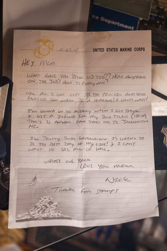 A letter written by Lance Cpl. Nicholas Smarr to his mother while he was in recruit training, is displayed at the Smarr residence in Americus, Ga., Dec. 6, 2018. Smarr served as a police officer for the Americus Police Department before being killed in the line of duty on Dec. 7, 2016. Smarr was a Reserve Marine and was posthumously awarded the Navy and Marine Corps Medal on Dec. 7, 2018. (U.S. Marine Corps photo by Cpl. Niles Lee)