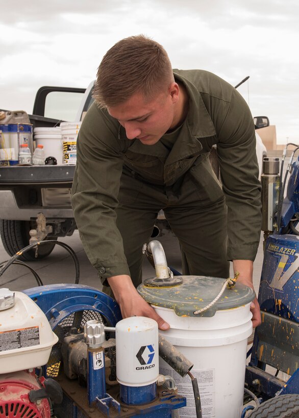 Marines offer helping hand to paint airfield