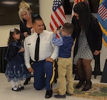 Family pins father with new rank