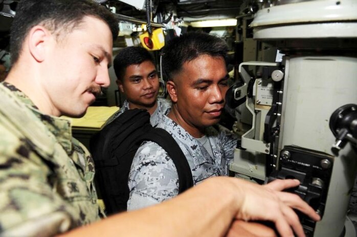 USS Greeneville and Emory S. Land host Philippine Delegates Aboard Ship, Submarine during Port Visit
