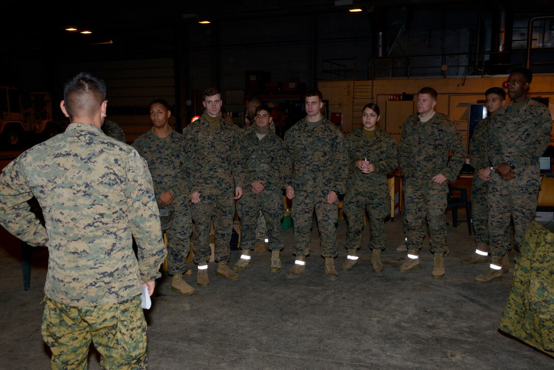 U.S. Marines prepare to receive approximately 300 Marines from units all across II Marine Expeditionary Force as they arrive at Vaernes Air Station, Norway, from Camp Lejeune, N.C., on Oct. 3, 2018, in order to participate in Exercise Trident Juncture 2018. Trident Juncture 18 enhances the U.S. and NATO Allies' abilities to work together collectively to conduct military operations under challenging conditions. (U.S. Marine Corps photo by GySgt. Rebekka S. Heite)