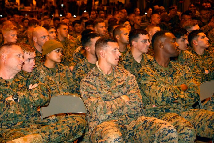 Approximately 300 Marines from units all across II Marine Expeditionary Force receive an orientation brief after arriving at Vaernes Air Station, Norway, from Camp Lejeune, N.C., on Oct. 3, 2018, in order to participate in Exercise Trident Juncture 2018. Trident Juncture 18 enhances the U.S. and NATO Allies' abilities to work together collectively to conduct military operations under challenging conditions. (U.S. Marine Corps photo by GySgt. Rebekka S. Heite)