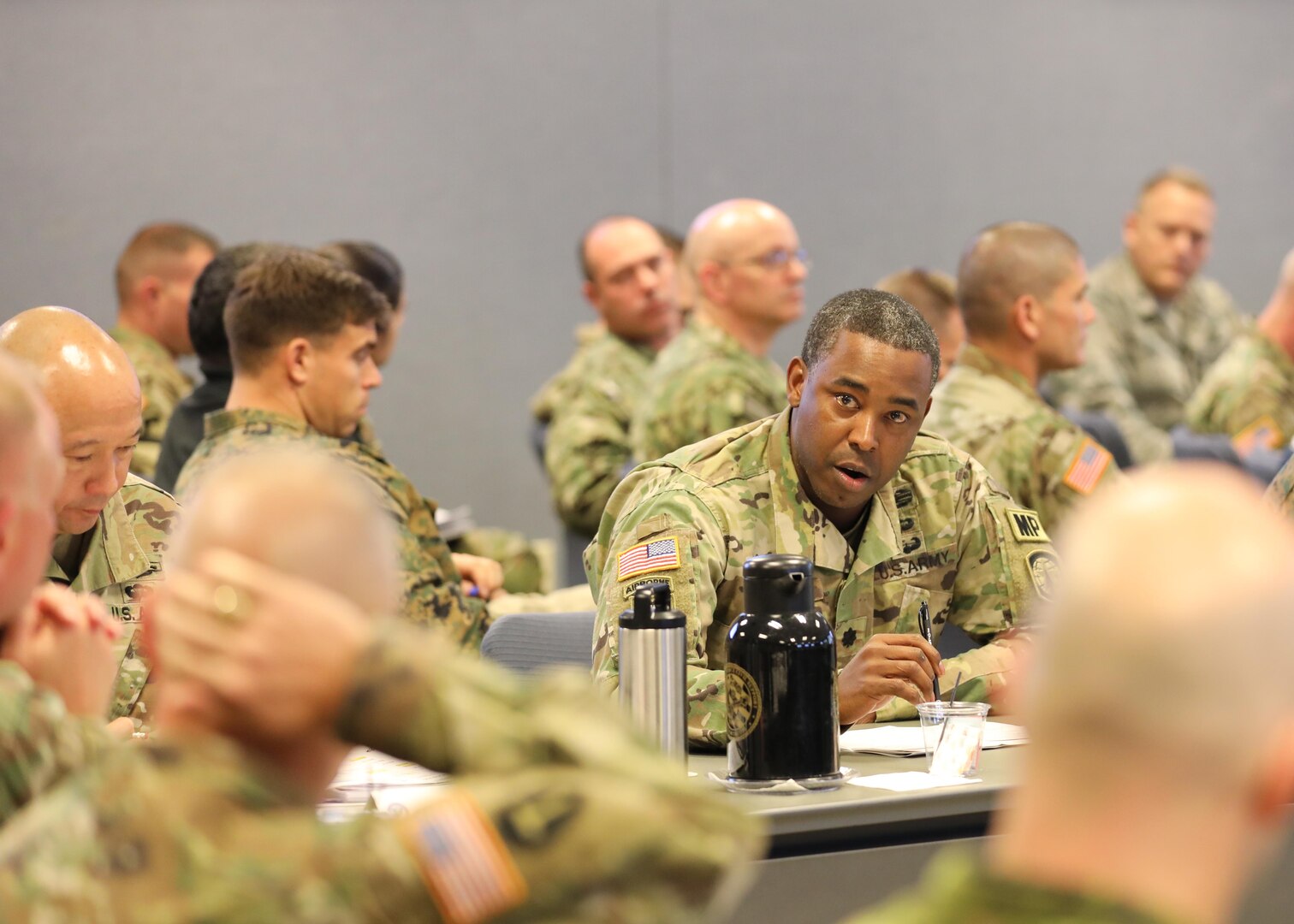 U.S. Army Lt. Col. Maurice Green, deputy commander of the 16th Military Police Brigade, Fort Bragg, N.C., speaks to the panel of JTF-CS Mission Planning Conference (MPC) at Fort Eustis, Va., Dec 4, 2018. Senior leaders and representatives from 26 units across the United States and Canada attended the two-day conference. The MPC prepared and strengthened communication roles of the Defense Chemical, Biological, Radiological and Nuclear (CBRN) Response Force (DCRF) and other DoD CBRN Response Enterprise (CRE) entities for participation in response operations. In the event of a catastrophic CBRN incident, the JTF-CS and DCRF missions assist local, state, federal and tribal partners in saving lives, preventing further injury, and providing critical support to enable community recovery when conducting Defense Support of Civil Authorities response operations. (DoD photo by U.S. Air Force Tech. Sgt. Michael Campbell/ Released)