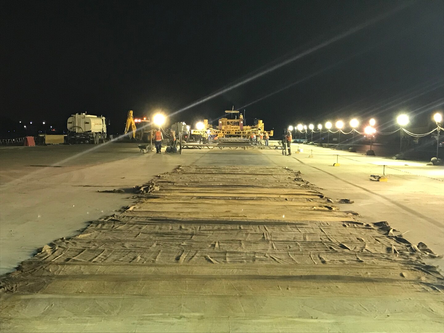 The Middle East District delivers U.S. military construction projects that support U.S. forces across the U.S. Central Command area of responsibility and carries out projects through the Defense Department’s security assistance program working with allied partner nations in the region. Here, contractors work at night to finish runway repairs at an undisclosed location in the Middle East. You can read more about the District’s airfield pavement work in support of USCENTCOM here: https://www.army.mil/article/212271/usace_district_paves_the_way_to_improved_process