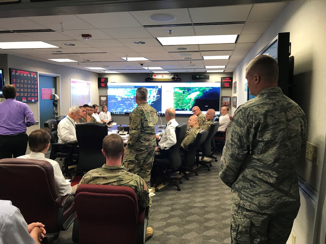 Lt. Gen. Todd T. Semonite, U.S. Army Chief of Engineers and Commanding General of the U.S. Army Corps of Engineers, and senior leaders closely monitor Hurricane Florence in Washington D.C., September 2018. On the left screen is the South Atlantic Division viewer produced by the GIS team supporting Hurricane Florence Response. (Submitted photo)