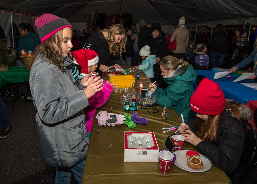 Families participate in arts and crafts after the Holiday Tree Lighting ceremony at Langley Air Force Base, Virginia, Dec. 6, 2018.