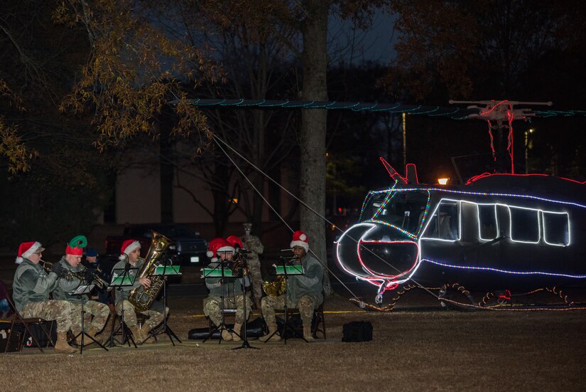 The U.S. Army Training and Doctrine Band performs carols during the Holiday Tree Lighting ceremony at Fort Eustis, Virginia, Dec. 7, 2018.