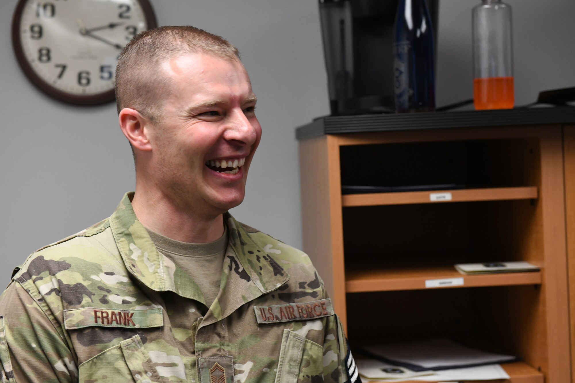 Senior Master Sgt. Jesse Frank, the 28th Security Forces Squadron operations superintendent, learns he has just been selected to become a chief master sergeant at Ellsworth Air Force Base, S.D., Dec. 4, 2018. Current 28th Bomb Wing chief master sergeants and base leadership traveled together to the 28th SFS to congratulate Frank for his achievement of making a rank that is held by only 1 percent of the Air Force. (U.S. Air Force photo by Airman 1st Class Thomas Karol)