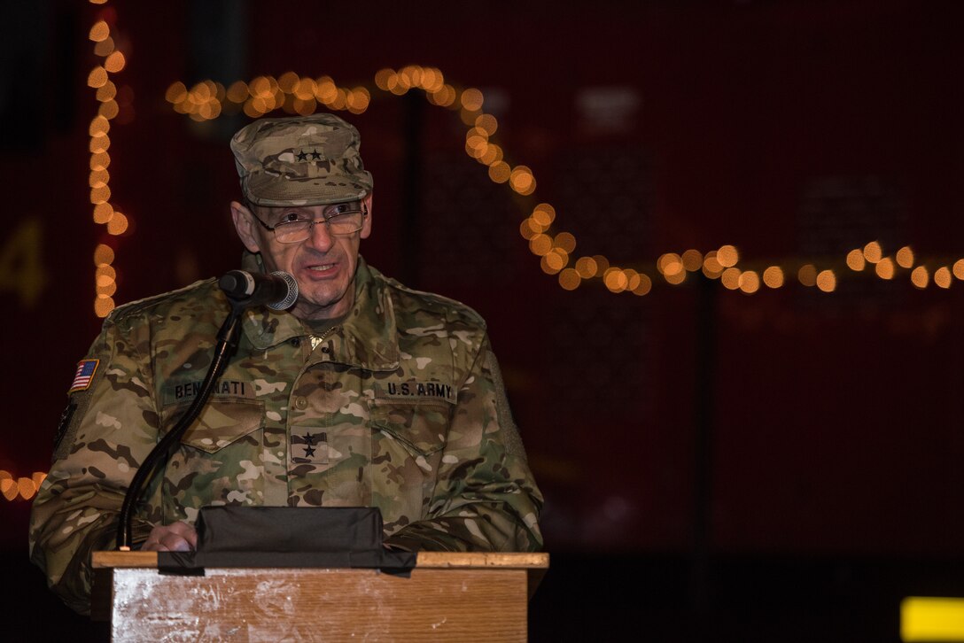 U.S. Army Maj. Gen. Paul Benenati, U.S. Army Training and Doctrine Command deputy chief of staff, sings during the Holiday Tree Lighting ceremony at Fort Eustis, Virginia, Dec. 7, 2018.