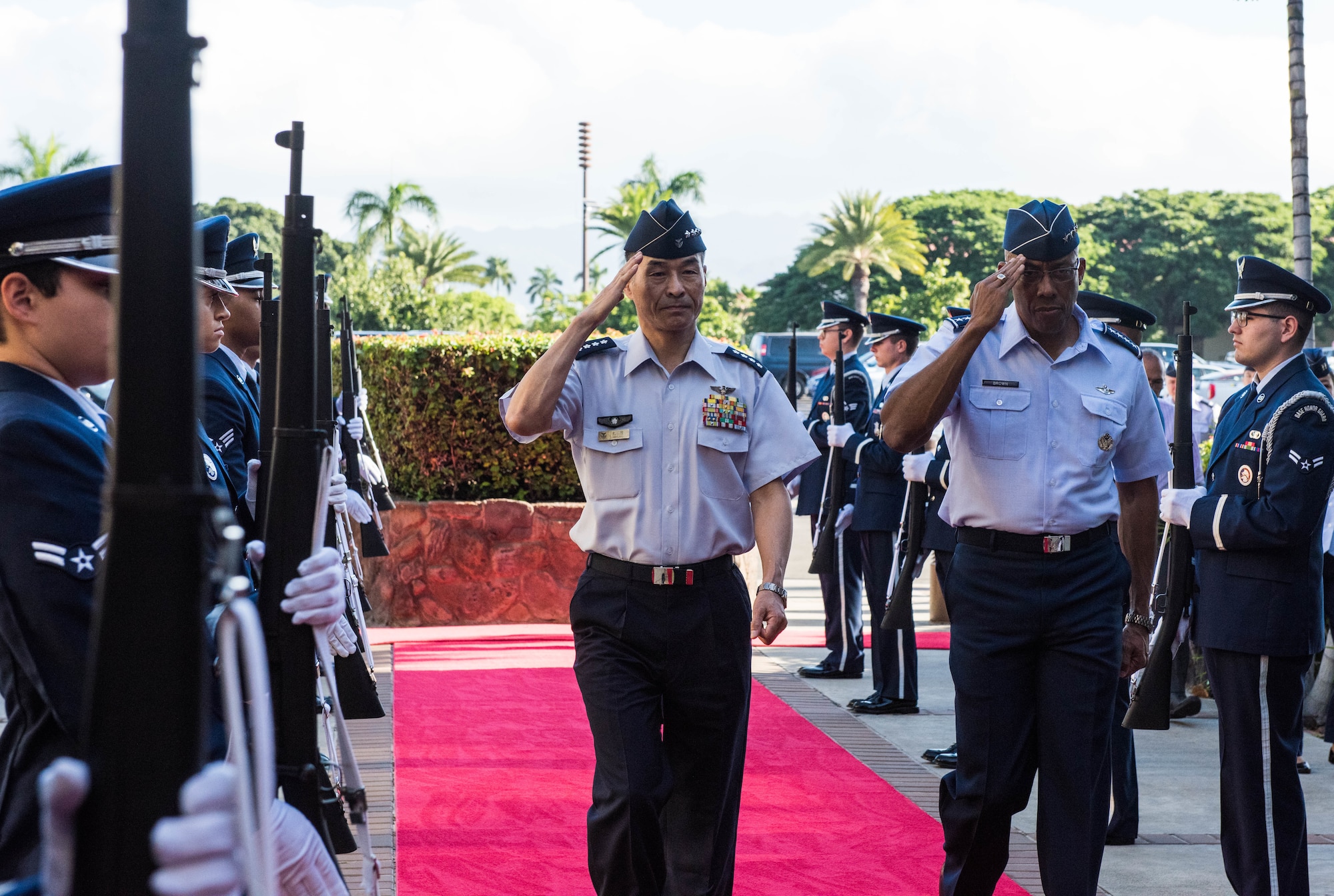 Gen. CQ Brown, Jr., Pacific Air Forces commander, hosted Gen. Yoshinari Marumo, Japanese Air Self-Defense Force chief of staff, salute the honor cordon at Headquarters PACAF on Joint Base Pearl Harbor-Hickam, Hawaii, Dec. 4, 2018. As part of his trip, Marumo met with PACAF leadership to discuss the PACAF strategy and future engagements. The U.S. and Japan routinely work together to promote security cooperation and support a free and open Indo-Pacific region. (U.S. Air Force photo/Staff Sgt. Hailey Haux)