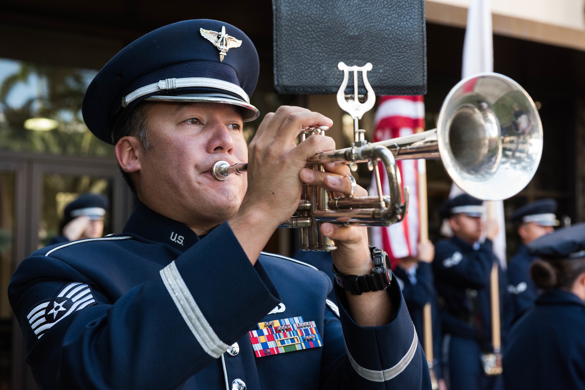 U.S. Air Force Band of the Pacific and U.S. Marine Corps Forces Pacific Band members prepare to Gen. Yoshinari Marumo, Japanese Air Self-Defense Force chief of staff, to Headquarters Pacific Air Forces on Joint Base Pearl Harbor-Hickam, Hawaii, Dec. 4, 2018. As part of his trip, Marumo met with PACAF leadership to discuss the PACAF strategy and future engagements. The U.S. and Japan routinely work together to promote security cooperation and support a free and open Indo-Pacific region. (U.S. Air Force photo/Staff Sgt. Hailey Haux)