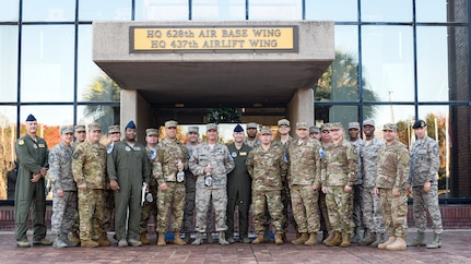 Joint Base Charleston Chief’s group members and the newest chief master sergeant selects stand together outside the headquarters building Dec. 4, 2018, at JB Charleston, S.C.  Chief master sergeant is the highest enlisted rank in the Air Force and is held by only one percent of the enlisted force.