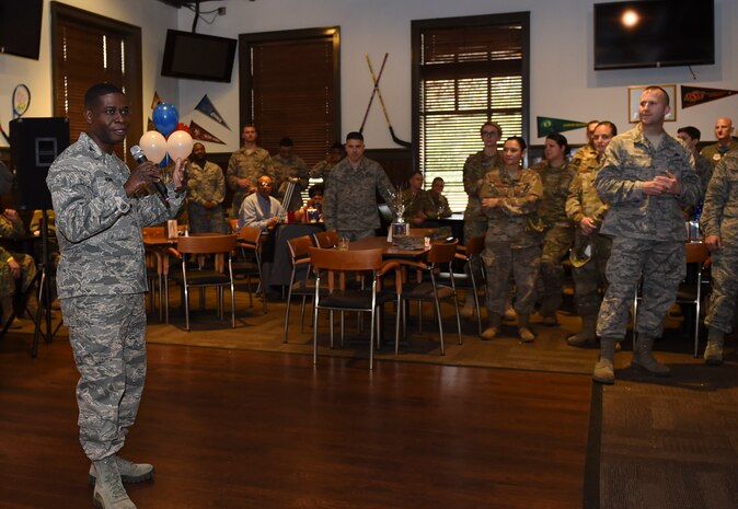 Col. Terrence Adams, 628th Air Base Wing and Joint Base Charleston commander, congratulates newest chief selects during a release party held Dec. 7, 2018, at JB Charleston, S.C. A release party was held in their honor at the Charleston Club, where base members gathered in support and celebration.