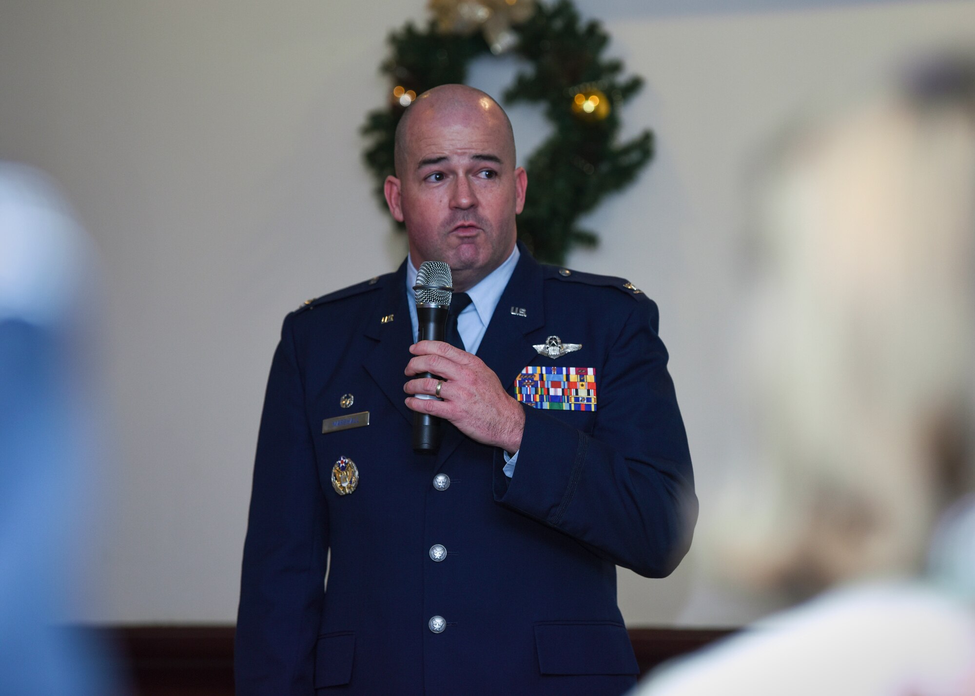 U.S. Air Force Col. Will Marshall, 48th Fighter Wing commander, gives a welcome speech during the Yuletide reception at Royal Air Force Lakenheath, England, Dec. 7, 2018. The Yuletide reception is an opportunity for U.S. Air Force service members and local leaders to get together and reflect on the past year of partnership. (U.S. Air Force photo by Airman 1st Class Madeline Herzog)