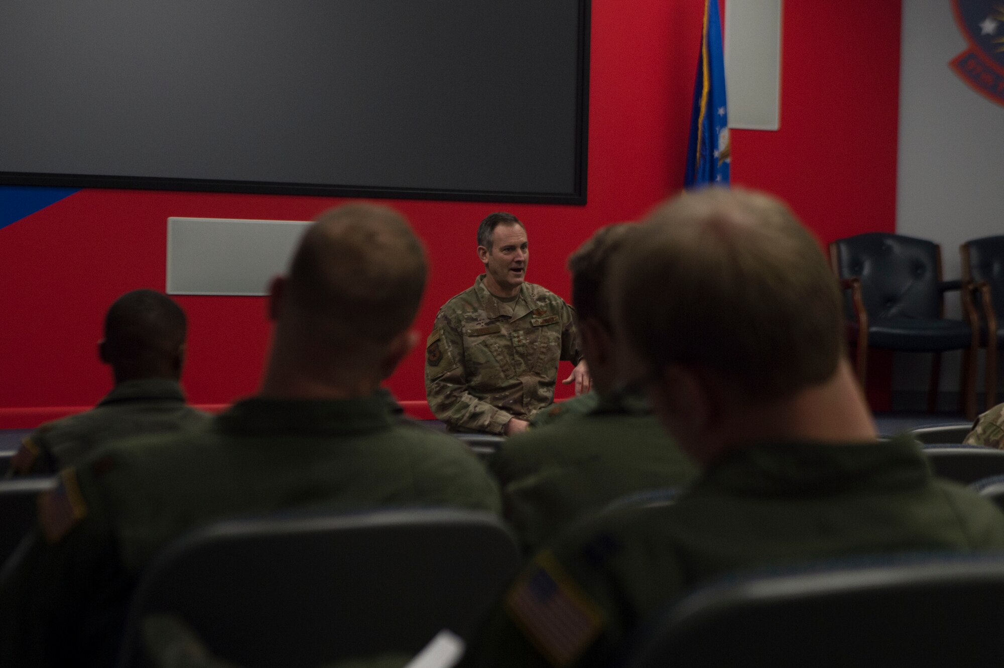 a man talking to a crowd