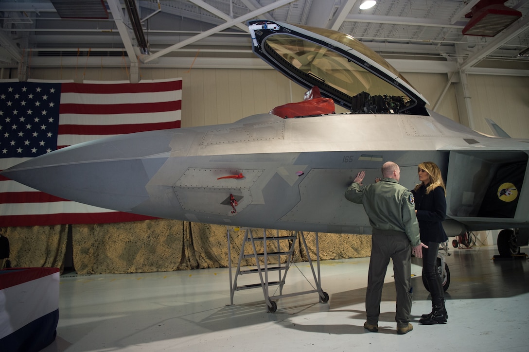 U.S. Air Force Col. Jason Hinds, 1st Fighter Wing commander, gives a tour of the F-22 Raptor to First Lady Melania Trump at Joint Base Langley-Eustis, Virginia, Dec. 12, 2018.