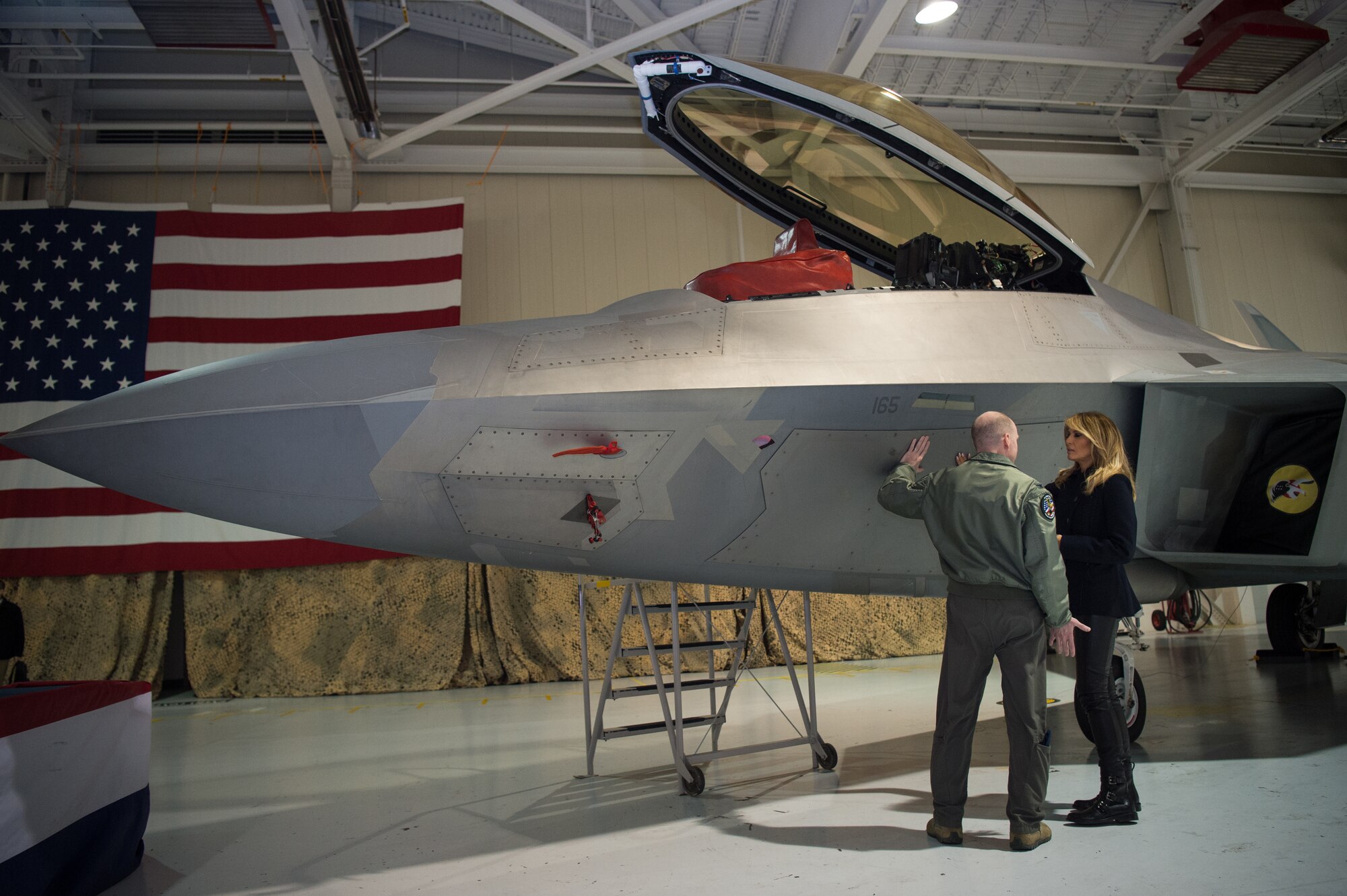 U.S. Air Force Col. Jason Hinds, 1st Fighter Wing commander, gives a tour of the F-22 Raptor to First Lady Melania Trump at Joint Base Langley-Eustis, Virginia, Dec. 12, 2018.