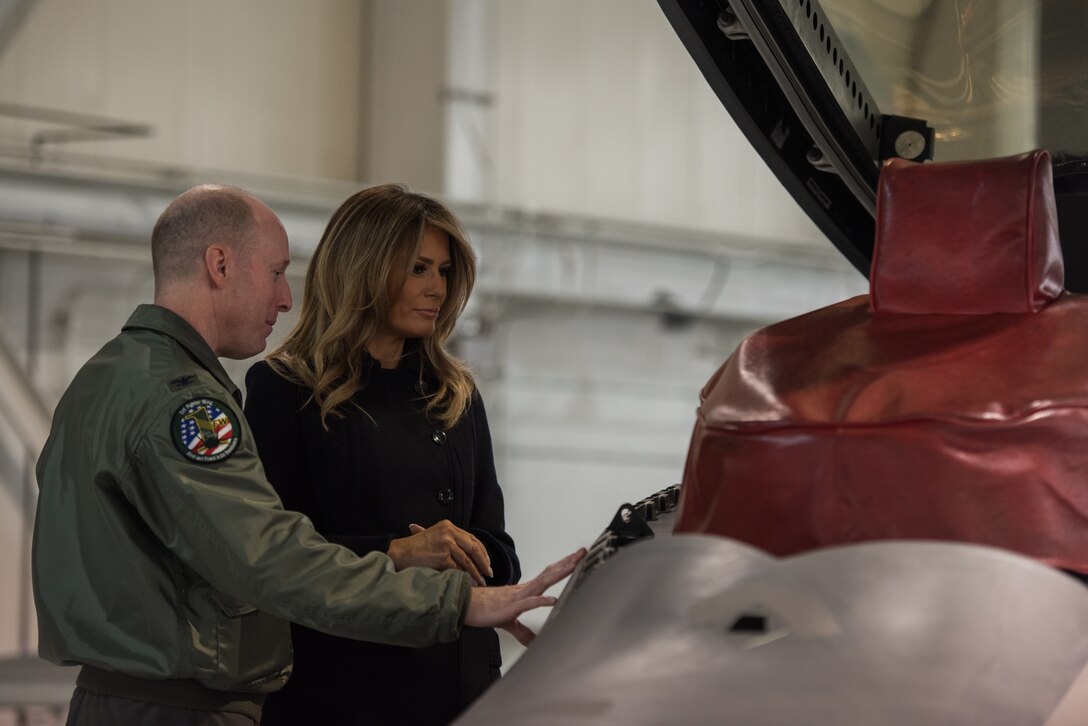 U.S. Air Force Col. Jason Hinds, 1st Fighter Wing commander, gives a tour of the F-22 Raptor to First Lady Melania Trump at Joint Base Langley-Eustis, Virginia, Dec. 12, 2018.