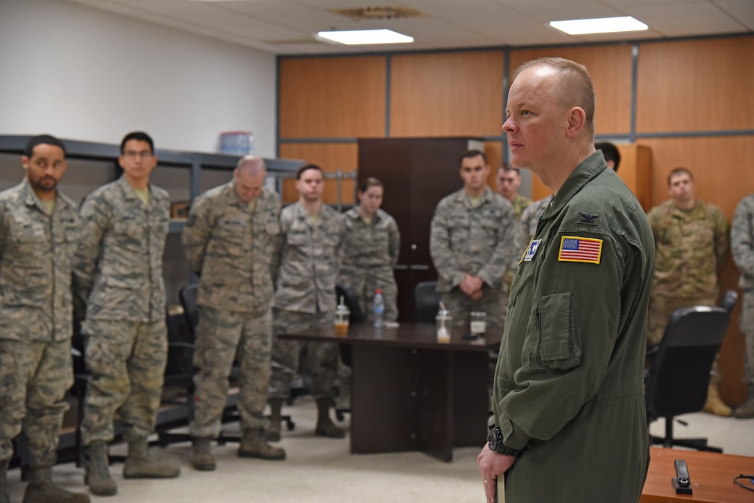 Col. Derek Salmi, 92nd Air Refueling Wing commander, speaks with Team Fairchild maintainers about the establishment of maintenance operations in a deployed location Dec. 4, 2018, at Morón Air Base, Spain. Following extensive repairs of Morón's flightline, the 92nd ARW was selected by Air Mobility Command to partner with U.S. Air Forces in Europe to revive deployed operations. (U.S. Air Force photo/Staff Sgt. Mackenzie Mendez)