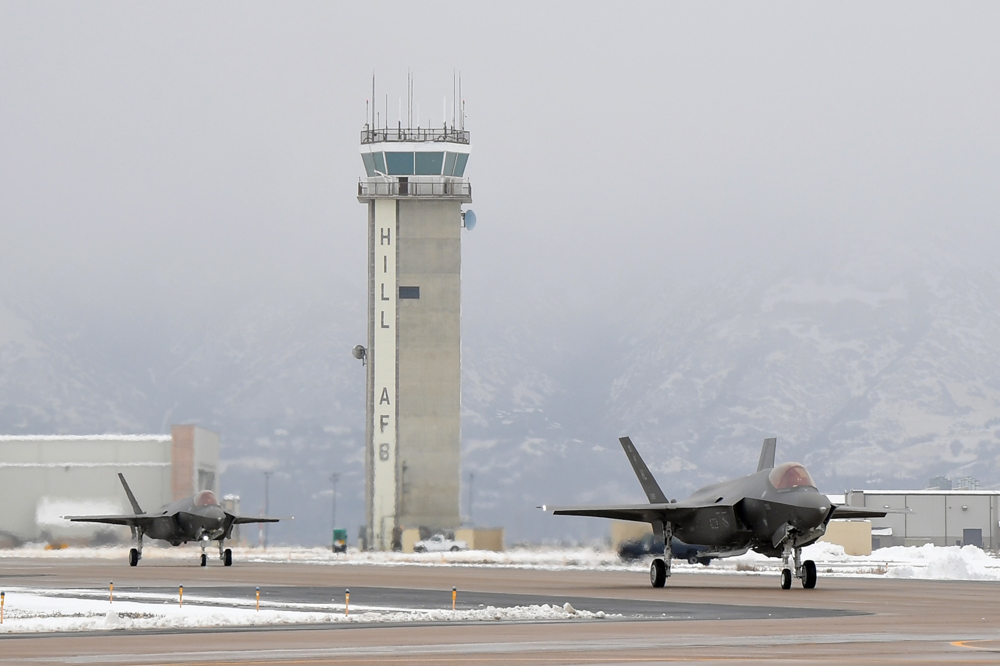 The 421st Fighter Squadron at Hill Air Force Base, Utah, received its first F-35A Lightning II Dec. 12. The squadron is the last of three squadrons in Hill’s 388th Fighter Wing to take possession of combat-ready aircraft, bringing the 388th Fighter Wing closer to full strength. Lt. Col. Richard Orzachowski, 421st FS commander and 1st Lt. Ryan Allen, the squadron's youngest wingman, flew the jets from the Lockheed Martin plant in Fort Worth, Texas into a snow-covered Hill AFB. The arrival of the first jets in the 421st brings the total number of F-35As at Hill to 52 and is a big step toward the 388th Fighter Wing having a full complement of 78 F-35A Lightning IIs by the end of 2019. (U.S. Air Force photo by Todd Cromar)