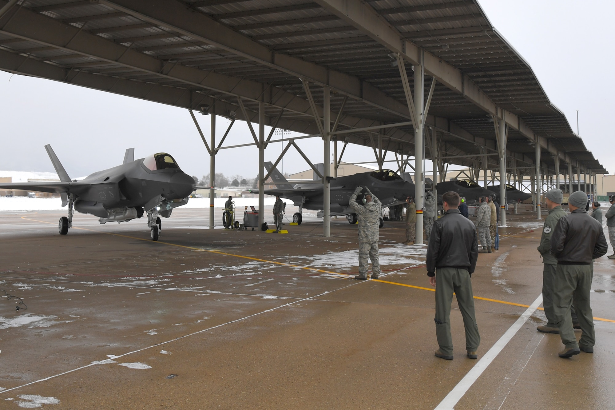The 421st Fighter Squadron at Hill Air Force Base, Utah, received its first F-35A Lightning II Dec. 12. The squadron is the last of three squadrons in Hill’s 388th Fighter Wing to take possession of combat-ready aircraft, bringing the 388th Fighter Wing closer to full strength. Lt. Col. Richard Orzachowski, 421st FS commander and 1st Lt. Ryan Allen, the squadron's youngest wingman, flew the jets from the Lockheed Martin plant in Fort Worth, Texas into a snow-covered Hill AFB. The arrival of the first jets in the 421st brings the total number of F-35As at Hill to 52 and is a big step toward the 388th Fighter Wing having a full complement of 78 F-35A Lightning IIs by the end of 2019. (U.S. Air Force photo by Todd Cromar)