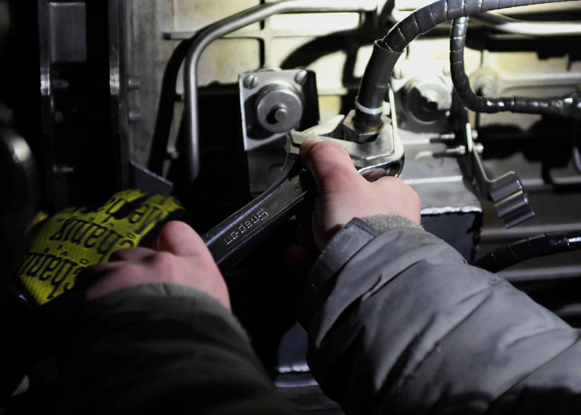 A 28th Aircraft Maintenance Squadron aerospace propulsion Airman performs maintenance on a grounded B-1B Lancer on the flight line at Ellsworth Air Force Base, S.D., Dec. 4, 2018. Aerospace propulsion Airmen specialize in the aircraft’s jet mechanics. (U.S. Air Force photo by Senior Airman Denise Jenson)