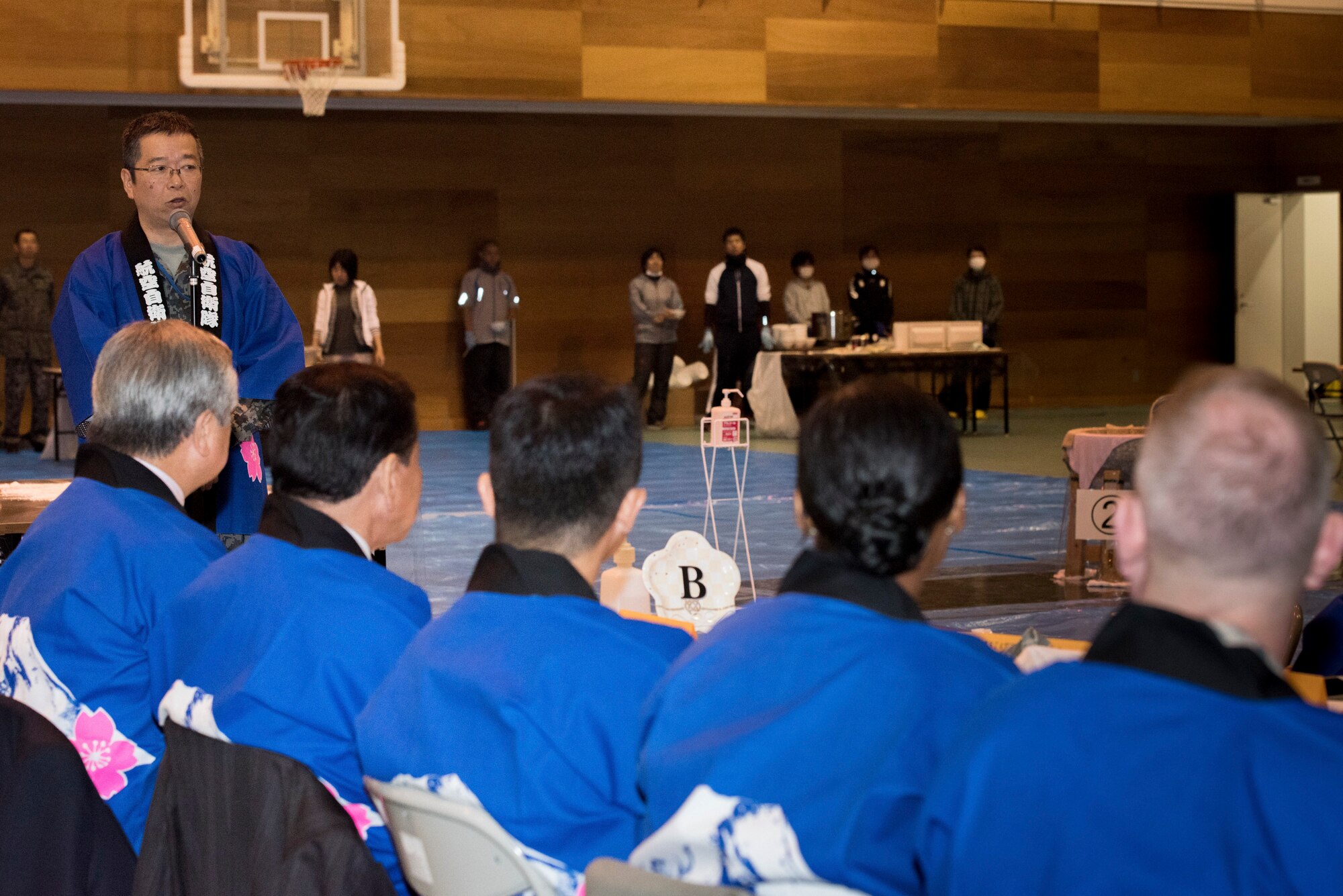 Japan Air Self-Defense Force Col. Takuya Saitou, Operation Support Wing commander, gives opening remarks during a rice pounding event hosted by Japan Air Self-Defense Force at Yokota Air Base, Japan, Dec. 12, 2018.
