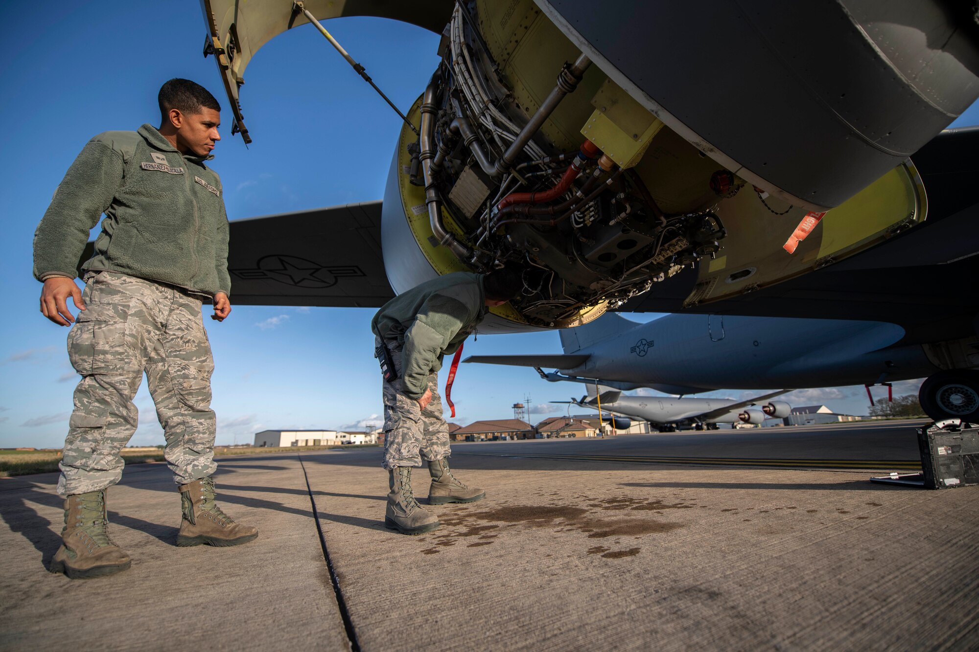 U.S. Air Force Tech. Sgt. Torrey Sanchez, 100th Aircraft Maintenance Squadron aerospace propulsion lead technician, and Senior Airman Ian Hernandez-Mancilla, 100th AMXS aerospace propulsion journeyman, inspect a KC-135 Stratotanker engine at RAF Mildenhall, England, Nov. 30, 2018. The aerospace propulsion shop maintains the engines, as well as conducts periodic inspections and unscheduled maintenance.  (U.S. Air Force photo by Senior Airman Luke Milano)