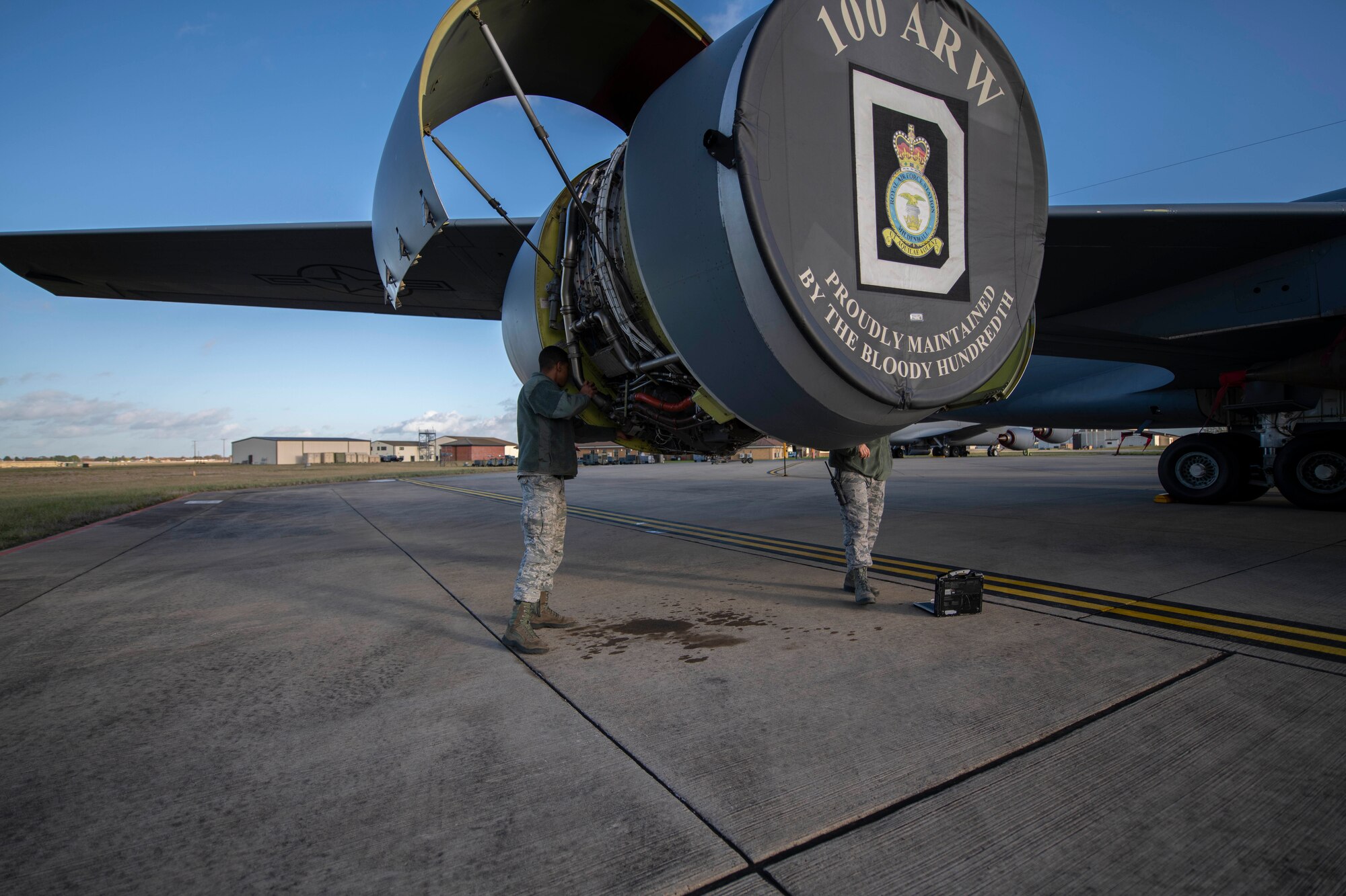 U.S. Air Force Tech. Sgt. Torrey Sanchez, 100th Aircraft Maintenance Squadron aerospace propulsion lead technician, and Senior Airman Ian Hernandez-Mancilla, 100th AMXS aerospace propulsion journeyman, inspect a KC-135 Stratotanker engine at RAF Mildenhall, England, Nov. 30, 2018. The aerospace propulsion Airmen’s success is exemplified through the Bloody Hundredth’s mission as a ready force and strategic forward base, projecting airpower through unrivaled air refueling across Europe and Africa. (U.S. Air Force photo by Senior Airman Luke Milano)