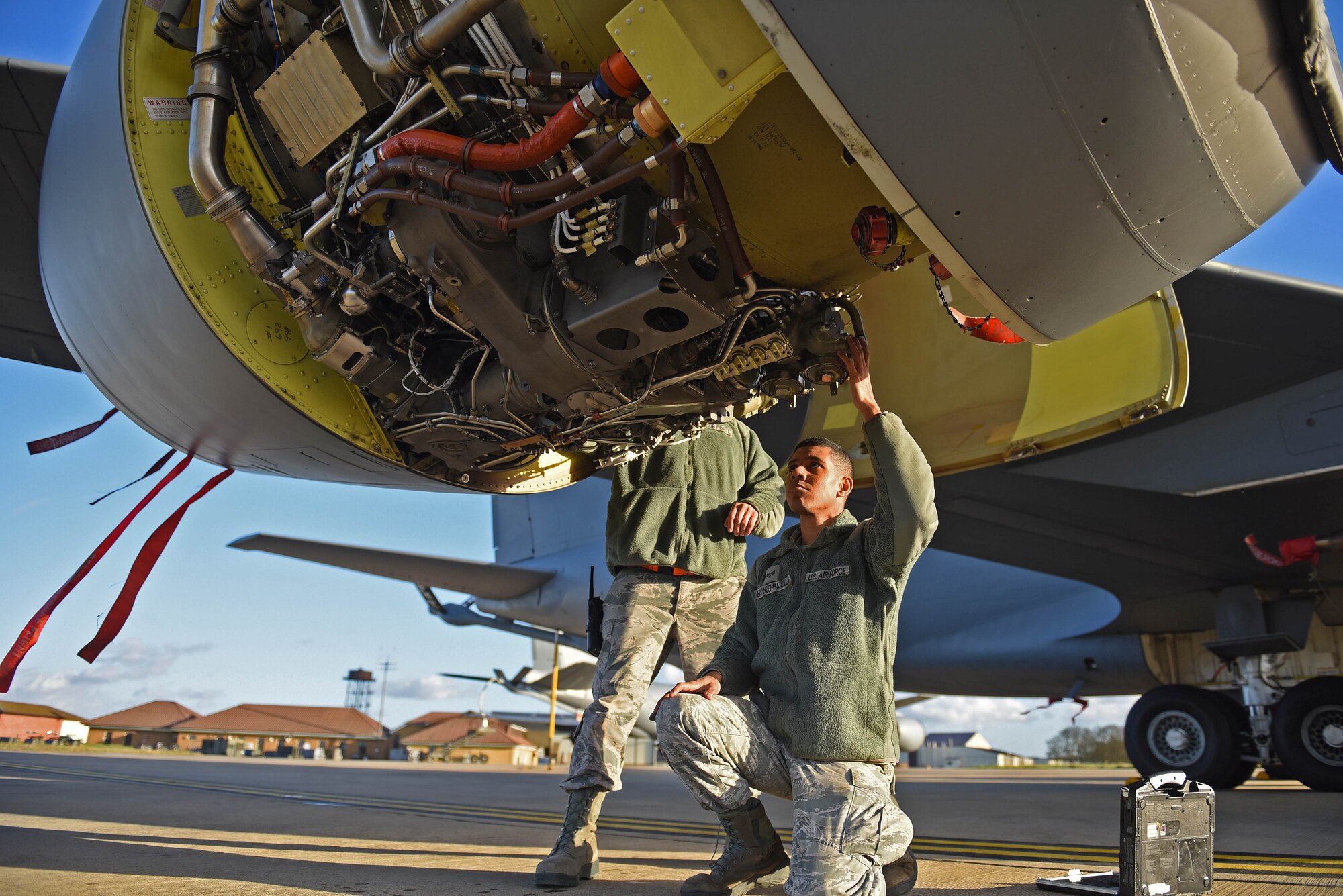 U.S. Air Force Tech. Sgt. Torrey Sanchez, 100th Aircraft Maintenance Squadron aerospace propulsion lead technician, and Senior Airman Ian Hernandez-Mancilla, 100th AMXS aerospace propulsion journeyman, inspects a KC-135 Stratotanker engine at RAF Mildenhall, England, Nov. 30, 2018. The aerospace propulsion Airmen’s success is exemplified through the Bloody Hundredth’s mission as a ready force and strategic forward base, projecting airpower through unrivaled air refueling across Europe and Africa. (U.S. Air Force photo by Senior Airman Luke Milano)