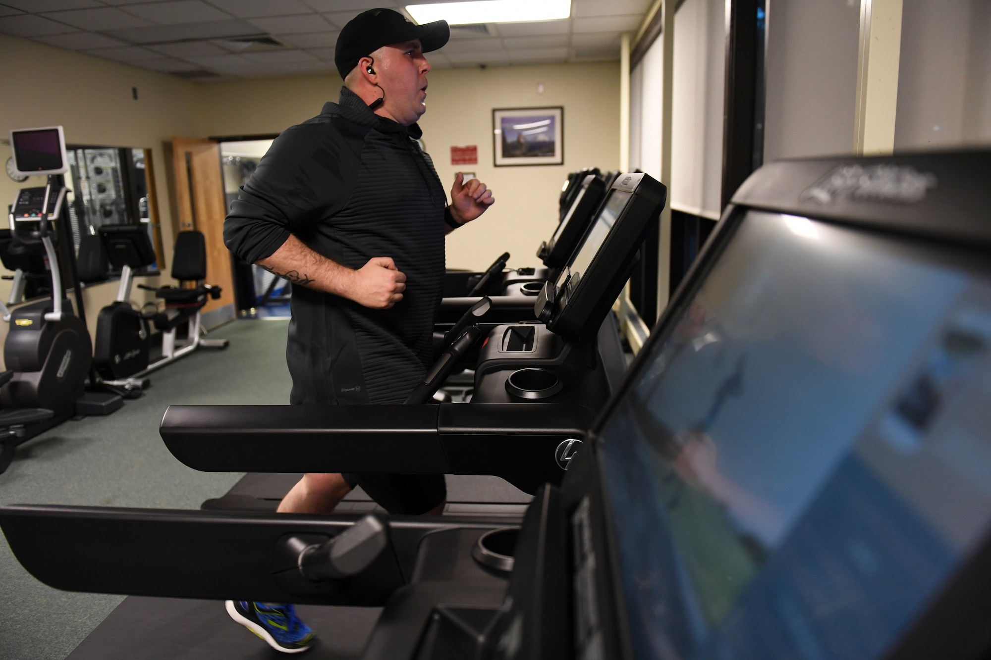 Staff Sgt. Michael Taylor, response member with the 911th Security Forces Squadron, runs on a treadmill at Pittsburgh IAP ARS, Pennsylvania, December 11, 2018. The 911th Airlift Wing Fitness Center replaced their older treadmills with brand new ones at the end of November. (U.S. Air Force photo by Joshua J. Seybert)