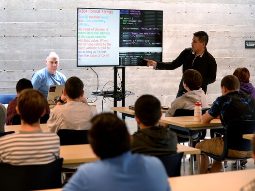 Staff Sgt. Justin Gonzalez, 33rd Network Warfare Squadron  incident response operator, and GhostWire Academy course developer and co-founder, hosts a Network+ class in San Antonio, Oct. 21, 2018. The academy is a free cyber certification training and award organization which serves San Antonio teenagers. (U.S. Air Force photo by Tech. Sgt. R.J. Biermann)