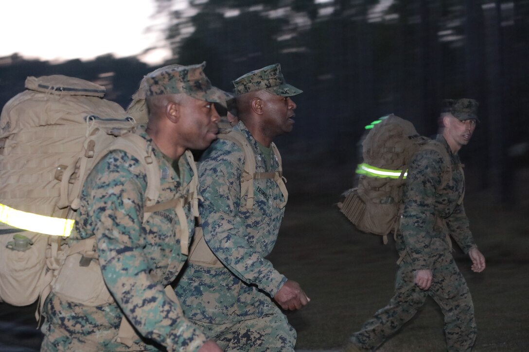 Marines with Marine Corps Logistics Base Albany commemorated the 77th anniversary of the attack of Pearl Harbor with a 3-mile Warrior Hike aboard the installation, Dec. 7. The attack was a surprise military strike by the Imperial Japanese Navy Air Service against the United States naval base at Pearl Harbor, Hawaii Territory, on the morning of Dec. 7, 1941. More than 50 Marines took the hike to remember the lessons learned from the attack and why it's important to always train and be ready for the unknown. (U.S. Marine Corps photo by Re-Essa Buckels)