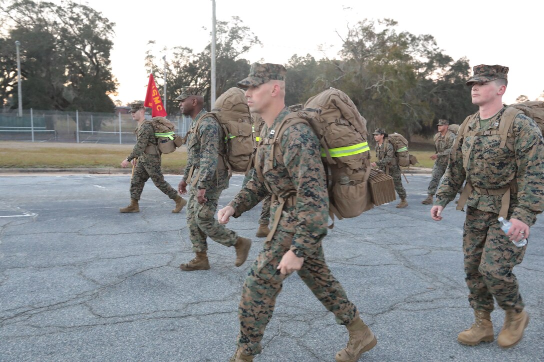 Marines with Marine Corps Logistics Base Albany commemorated the 77th anniversary of the attack of Pearl Harbor with a 3-mile Warrior Hike aboard the installation, Dec. 7. The attack was a surprise military strike by the Imperial Japanese Navy Air Service against the United States naval base at Pearl Harbor, Hawaii Territory, on the morning of Dec. 7, 1941. More than 50 Marines took the hike to remember the lessons learned from the attack and why it's important to always train and be ready for the unknown. (U.S. Marine Corps photo by Re-Essa Buckels)