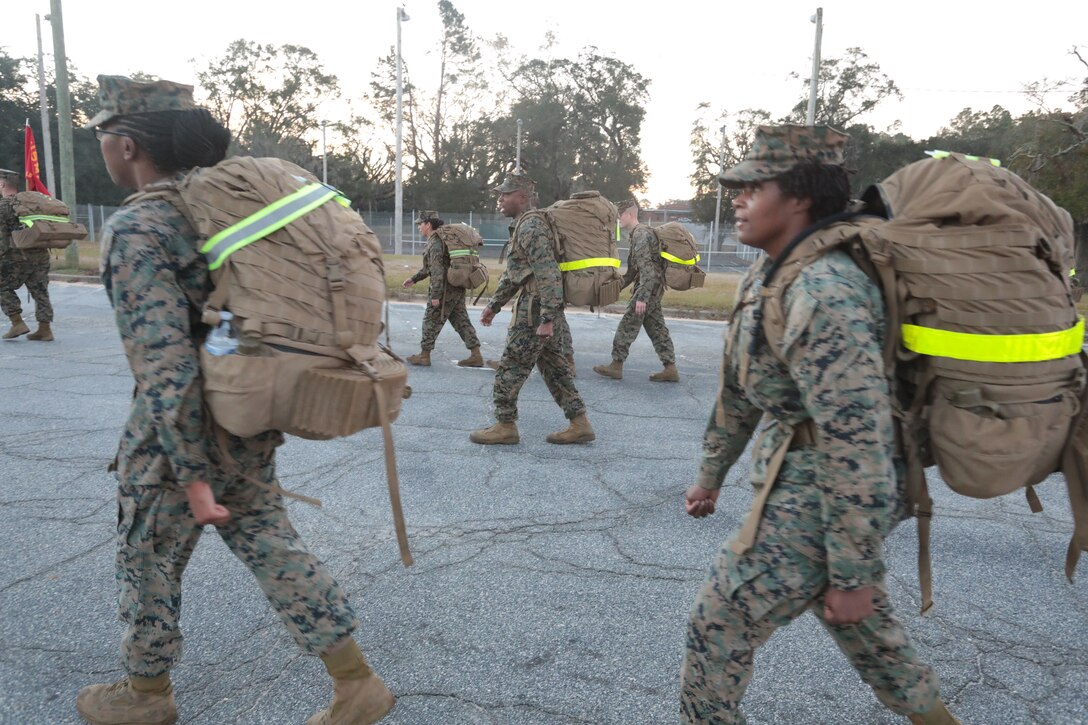 Marines with Marine Corps Logistics Base Albany commemorated the 77th anniversary of the attack of Pearl Harbor with a 3-mile Warrior Hike aboard the installation, Dec. 7. The attack was a surprise military strike by the Imperial Japanese Navy Air Service against the United States naval base at Pearl Harbor, Hawaii Territory, on the morning of Dec. 7, 1941. More than 50 Marines took the hike to remember the lessons learned from the attack and why it's important to always train and be ready for the unknown. (U.S. Marine Corps photo by Re-Essa Buckels)