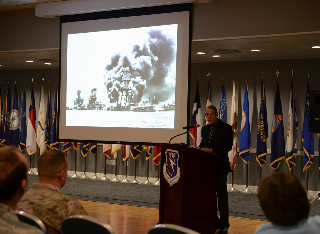 Dr. Daniel Haulman, Air Force Historical Research Agency historian, recounts the Attack on Pearl Harbor and numerous other bases during Fight’s On: Airmen Hackin’ the Mish, Dec. 7, 2018, on Columbus Air Force Base, Mississippi. In honor of the 77th anniversary of the Attack on Pearl Harbor, Columbus AFB reflected on its military heritage and the daring acts performed in defense of the nation. (U.S. Air Force photo by Airman Hannah Bean)