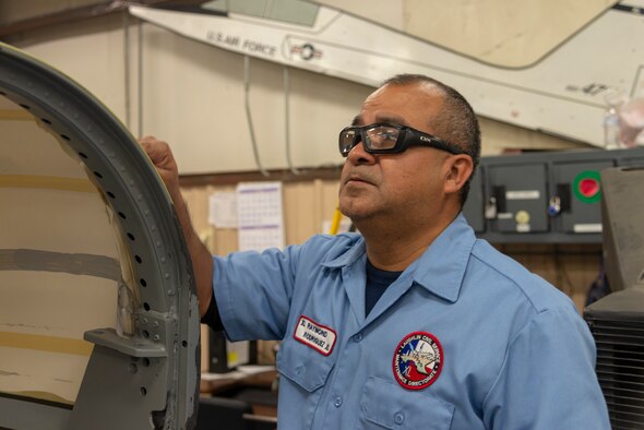 Ray Rodriguez, 47th Maintenance Directorate aircraft structural repair journeyman, was chosen by wing leadership to be the “XLer” of the week, for the week of Dec. 3, 2018, at Laughlin Air Force Base, Texas. For his expertise, timeliness in aircraft maintenance and unique skillset born from decades of sheet metal, working directly helps Laughlin train the next generation of multi-domain combat aviators. For all his hard work in aircraft maintenance, Rodriguez earned this week’s “XLer.” (U.S. Air Force photo by Senior Airman Daniel Hambor)