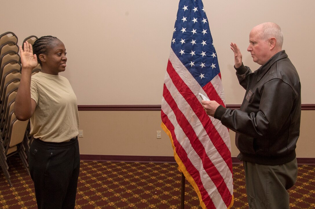 Marsha Robinson recites the oath of enlistment administered by Col. Thomas O. Pemberton, 514th Air Mobility Wing commander at Joint Base McGuire-Dix-Lakehurst, N.J., December 8, 2018. The District Court for the Northern District of California issued a ruling on November 16th, 2018, which states that the Defense Department provided no rational justification for the policy that referenced increased background checks and extended service requirements. The military services began slating recruits for training in the first week of December.