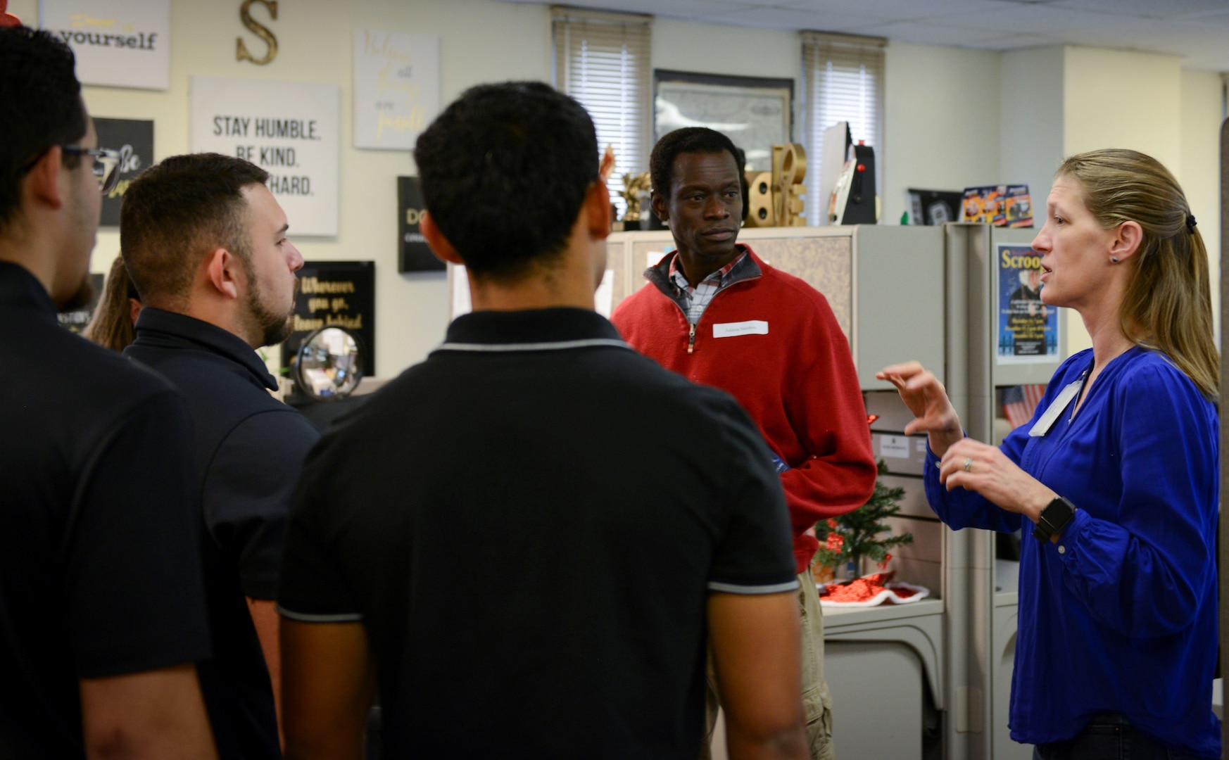 Texas A&M University San Antonio students speak with members of the Air Force’s Personnel Center at Joint Base San Antonio-Randolph Nov. 30. During their tour, the students visited different sections of AFPC where they learned about human resources specializations such as benefits and entitlements, classification and staffing.