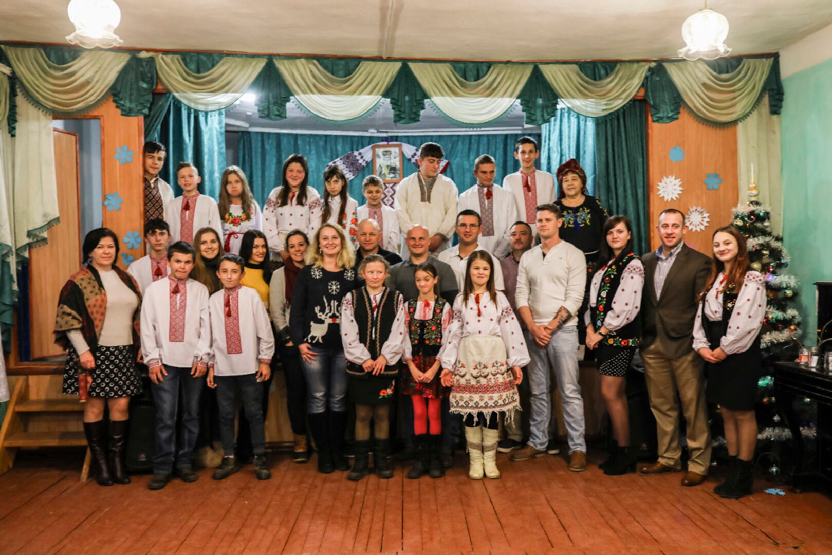 Children from local orphanage pose for picture alongside members of the 278th Armored Cavalry Regiment deployed in Yavoriv, Ukraine, Dec. 12, 2018. Many regiment members have visited with the children regularly.