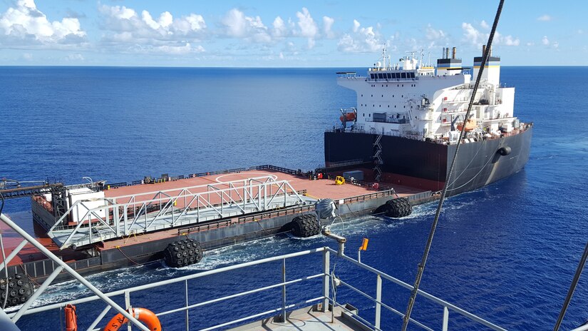 A ship approaches the USNS Soderman during a seabasing exercise.