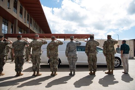 Members of the Defense POW/MIA Accounting Agency (DPAA) render honors during a chain of custody event for the recently identified remains of U.S. Army Cpl. Albert Mills at Joint Base Pearl Harbor-Hickam, Hawaii, Nov. 9, 2018. Mills, a member of Company F, 2nd Battalion, 5th Cavalry Regiment, 1st Cavalry Division during the Korean War, was transferred and buried in his hometown of Dallas. DPAA conducts global search, recovery and laboratory operations to provide the fullest possible accounting for our missing personnel to their families and the nation.