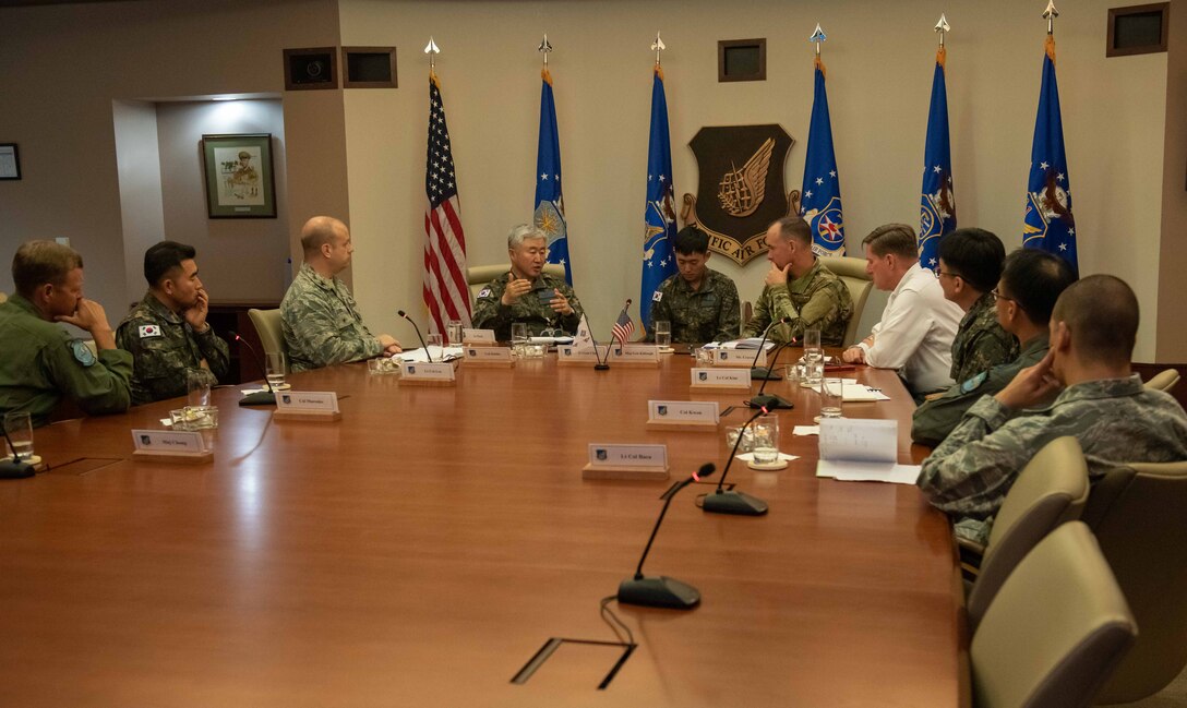 U.S. Air Force Maj. Gen. Brian M. Killough, Pacific Air Forces chief of staff, and Republic of Korea Air Force Lt. Gen. Hyun Koog Choi, ROKAF Academy superintendent, participate in a roundtable discussion at Headquarters PACAF on Joint Base Pearl Harbor-Hickam, Hawaii, Dec. 11, 2018. Choi, recently selected as the new academy superintendent, visited Indo-Pacific Command and PACAF to promote ROK and U.S. cooperation, discuss issues related to interoperability and receive a PACAF area of responsibility immersion. The visit highlighted the enduring partnership and friendship between the two nations and their commitment to a free and open Indo-Pacific. (U.S. Air Force Photo by Staff Sgt. Daniel Robles)