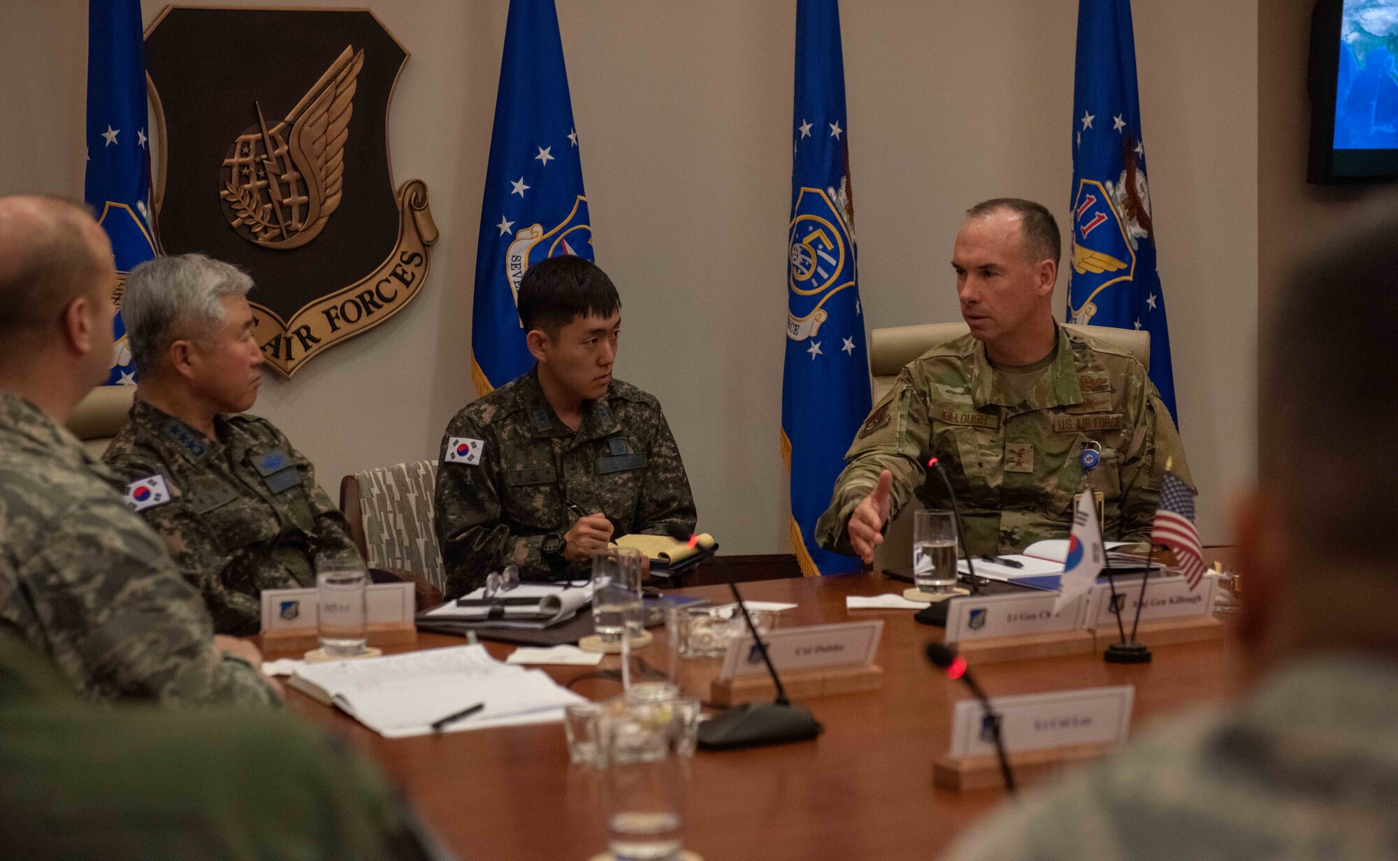 U.S. Air Force Maj. Gen. Brian M. Killough, Pacific Air Forces chief of staff, (far right)  Republic of Korea Air Force Lt Gen. Hyun Koog Choi, ROKAF Academy superintendent, (far left) participate in a roundtable discussion at Headquarters PACAF on Joint Base Pearl Harbor-Hickam, Hawaii, Dec. 11, 2018. Choi, who was recently selected as the new academy superintendent, visited Indo-Pacific Command and PACAF to promote ROK and U.S. cooperation as well as exchange plans and ideas to maintain maximum readiness. The strong friendship and defense relationship between the U.S. and ROK assures stability in the region and solidifies the commitment to a free and open Indo-Pacific region. (U.S. Air Force Photo by Staff Sgt. Daniel Robles)