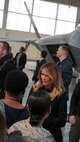 First Lady Melania Trump visited Joint Base Langley-Eustis Soldiers and Airmen, Dec. 12, 2018. Mrs. Trump addressed the service members, DoD civilians, family members and students from across Hampton Roads taking time to shake their hands and pose for photographs in an aircraft hangar at the 1st Fighter Wing. “The President and I have unconditional appreciation for all that you do,” she said. “This administration will always stand with the men and women of the armed forces and the families that support them. Merry Christmas and Happy New Year to all of you and may God bless you, your families and the United States of America.” (Courtesy photo by David Phillips/ Released)